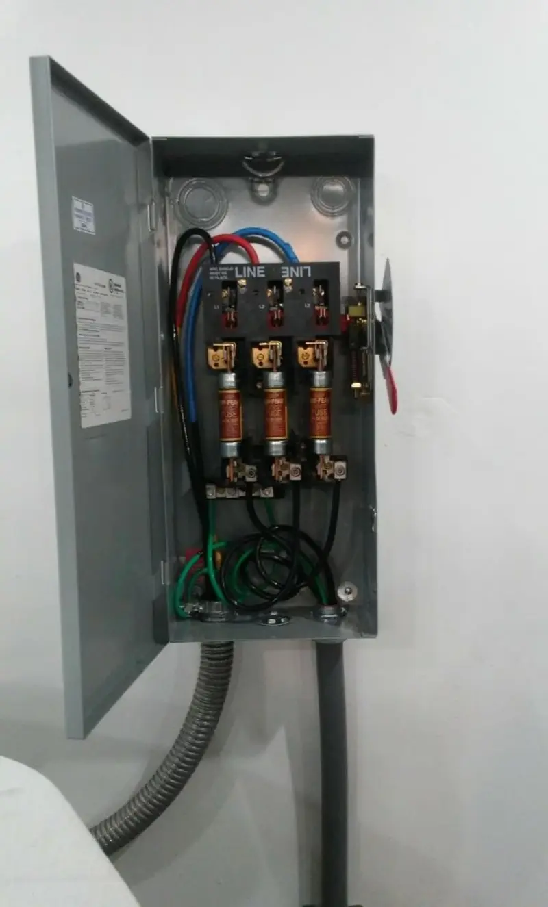 Three-phase disconnect switch installed for Smoke Detector Installation in Discovery Bay